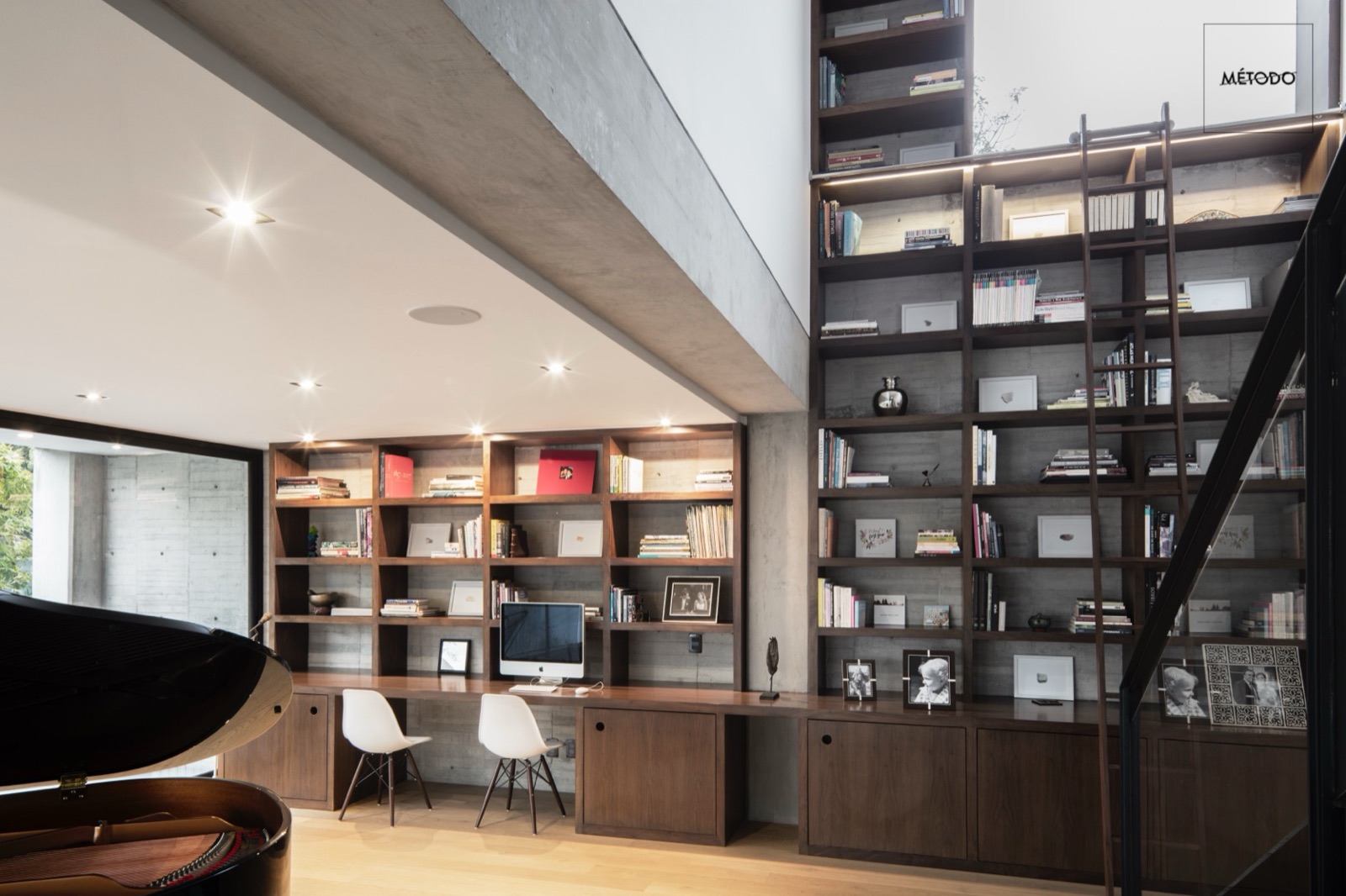 Library millwork · double-height wall